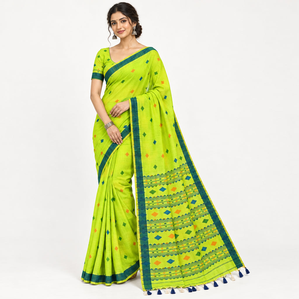 A lime green cotton saree with a dark green border, geometric patterns, and small colorful motifs