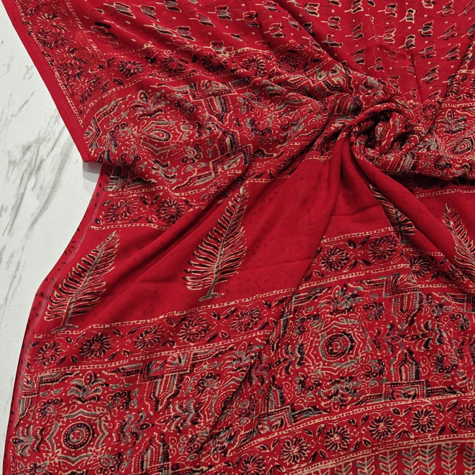Red chiffon saree with Lotus motifs