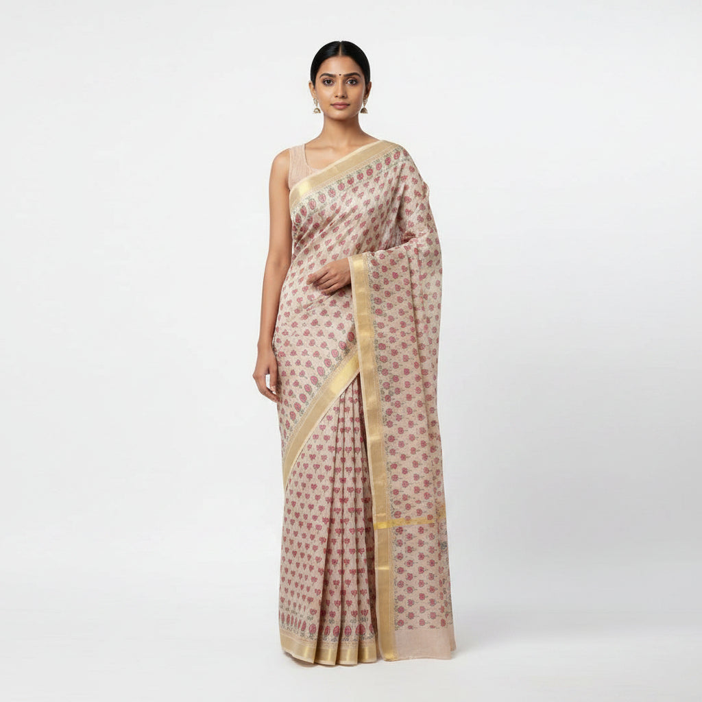 A close-up photo of a draped fabric item, likely a shawl or scarf, featuring a beige base with a pink and green floral pattern and gold trim, shown on a bed. The image is captured from a mobile phone app screenshot with a white vertical overlay on the right side.